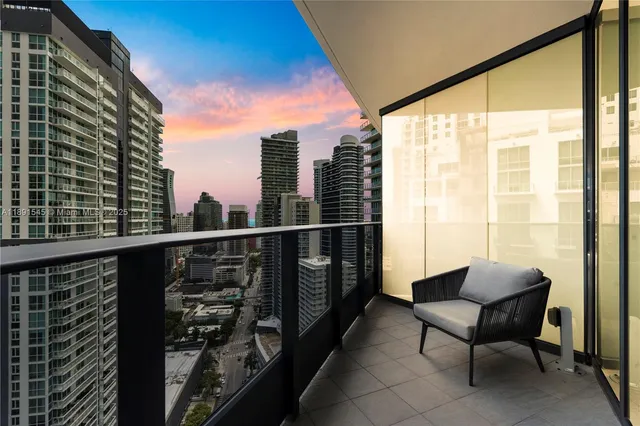 a view of balcony with furniture