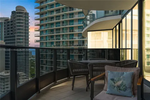 a bathroom with a bathtub and a window