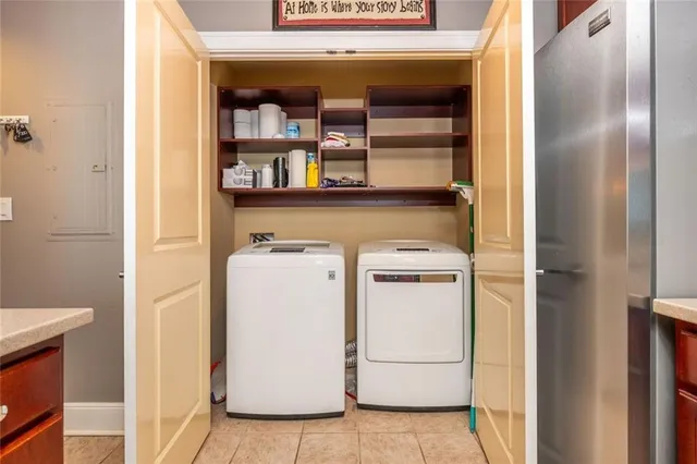 a utility room with dryer and washer
