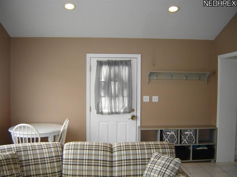 4048 Conover Road University Heights, OH 44118 - Photo 11 of 24 Rear door opens to wonderful slate patio and fully fenced-in yard.