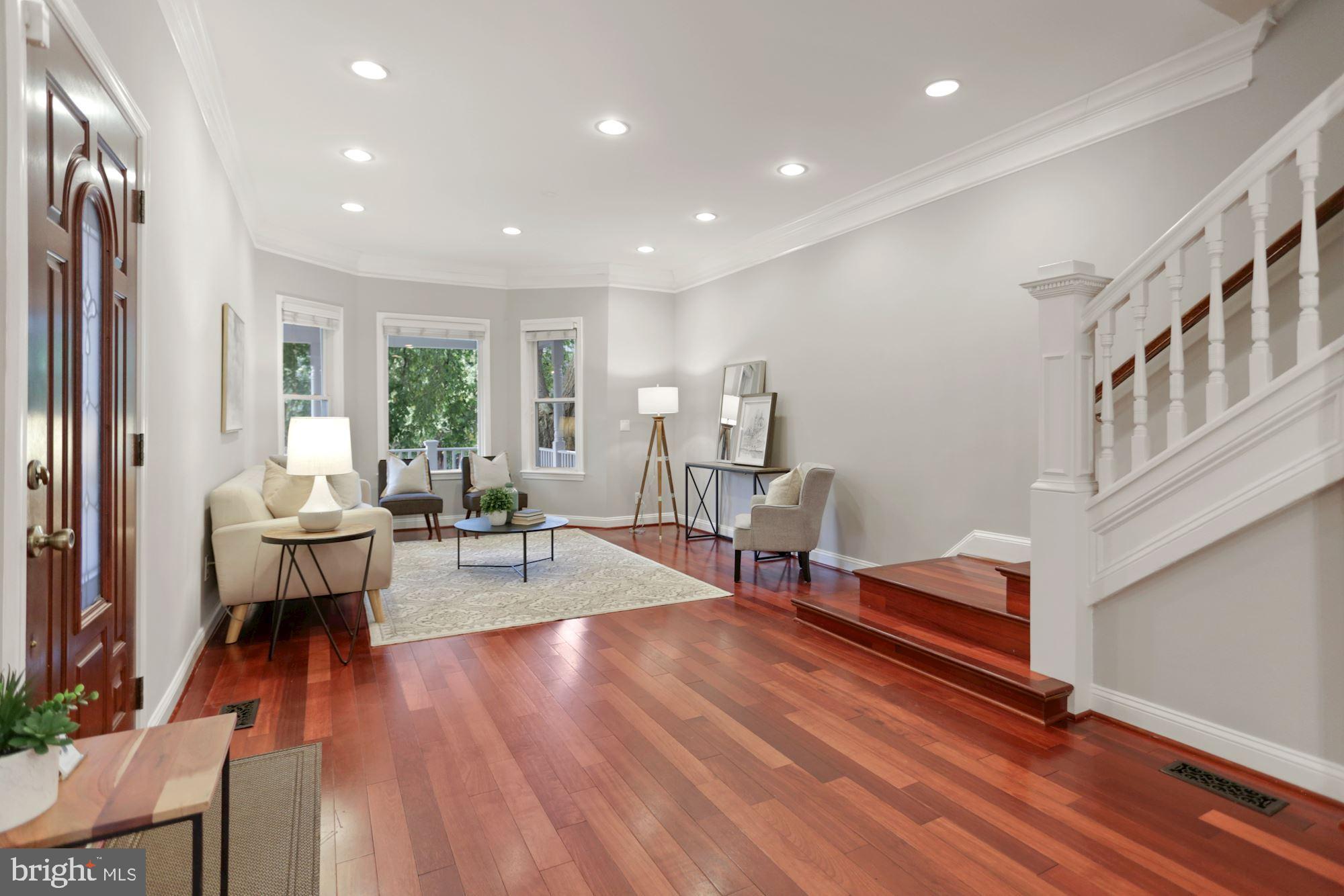 215 T Street Northeast Washington, DC 20002 - Photo 4 of 31 Bay Window and Recessed Lighting in Living Room