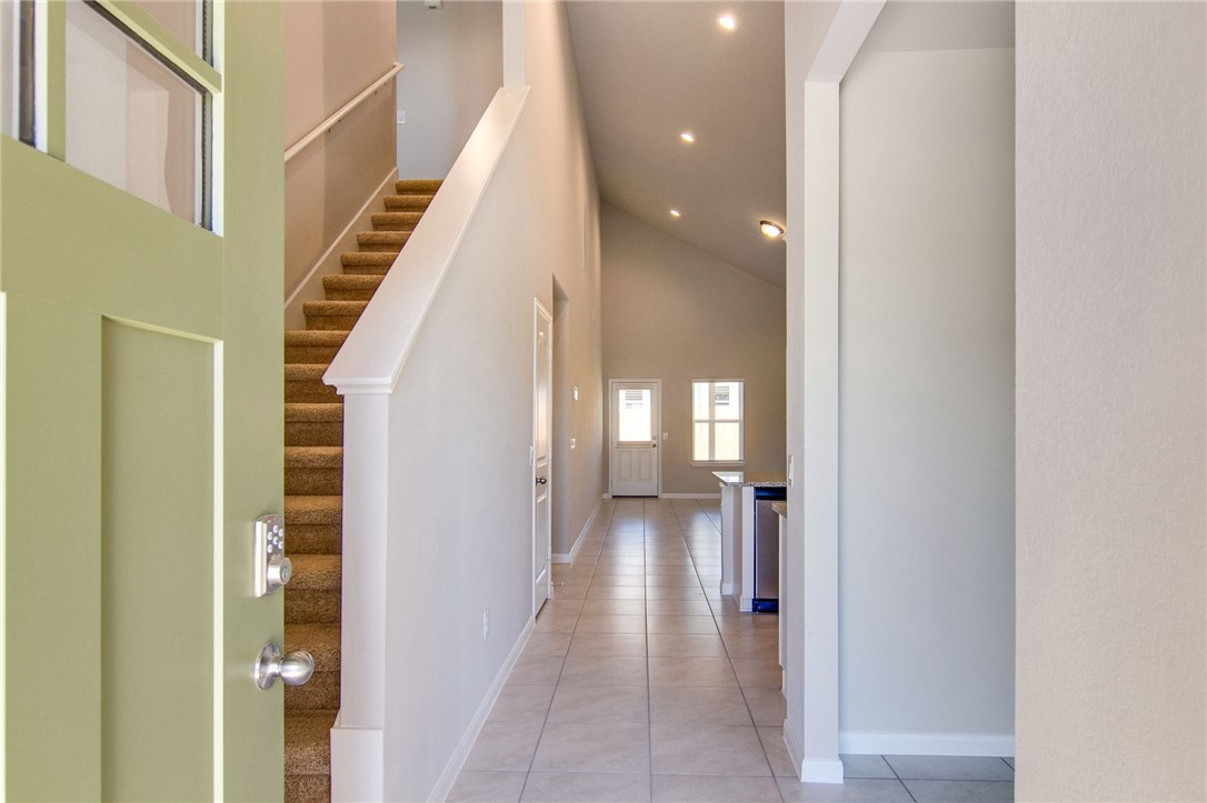 7012 Ranchito Drive Austin, TX 78744 - Photo 5 of 34 a view of a hallway with staircase
