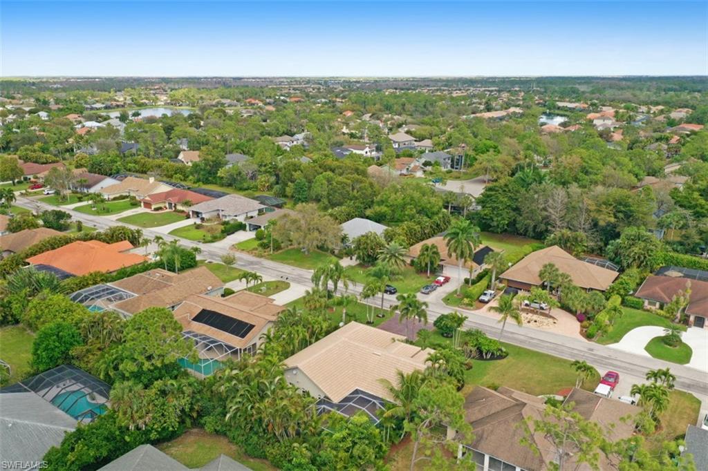 471 Ibis Way Naples, FL 34110 - Photo 32 of 32 an aerial view of residential houses with outdoor space