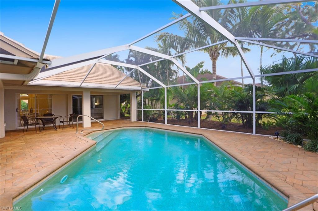 471 Ibis Way Naples, FL 34110 - Photo 6 of 32 a view of a house with swimming pool