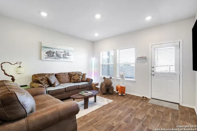 a living room with furniture and a couch
