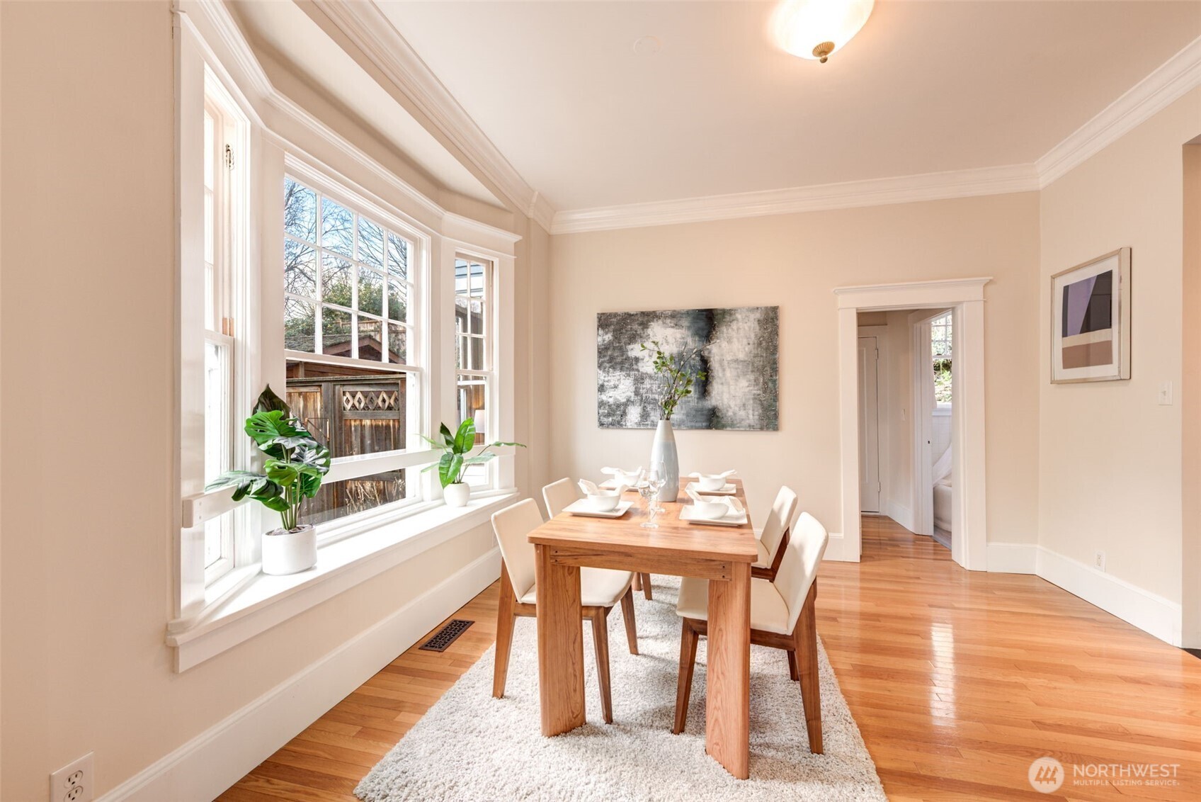 1523 35th Avenue Seattle, WA 98122 - Photo 11 of 35 a dining room with furniture and wooden floor