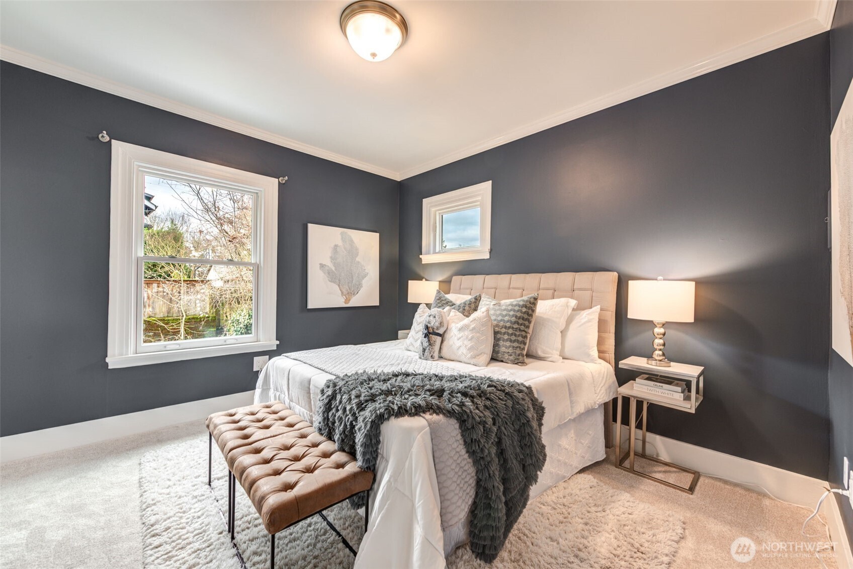 1523 35th Avenue Seattle, WA 98122 - Photo 26 of 35 a bedroom with a bed and a window