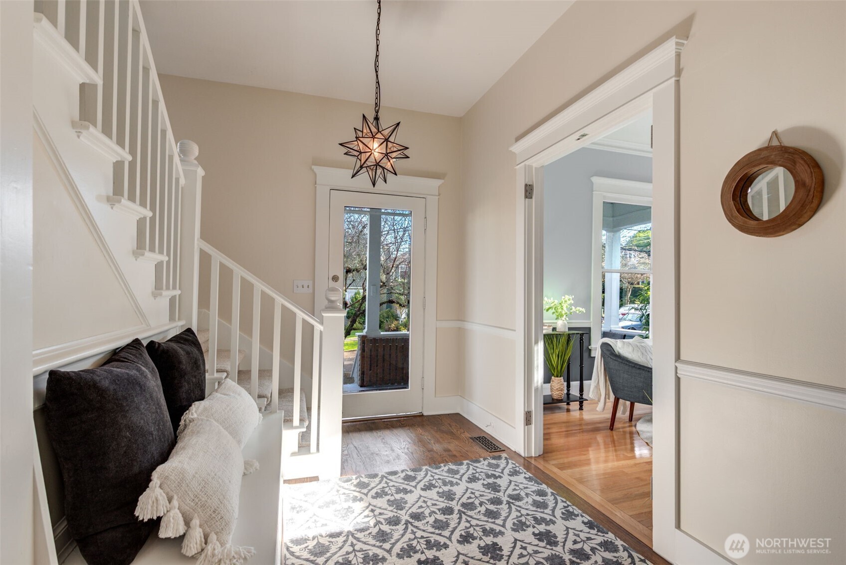 1523 35th Avenue Seattle, WA 98122 - Photo 6 of 35 a view of a hallway with windows and stairs