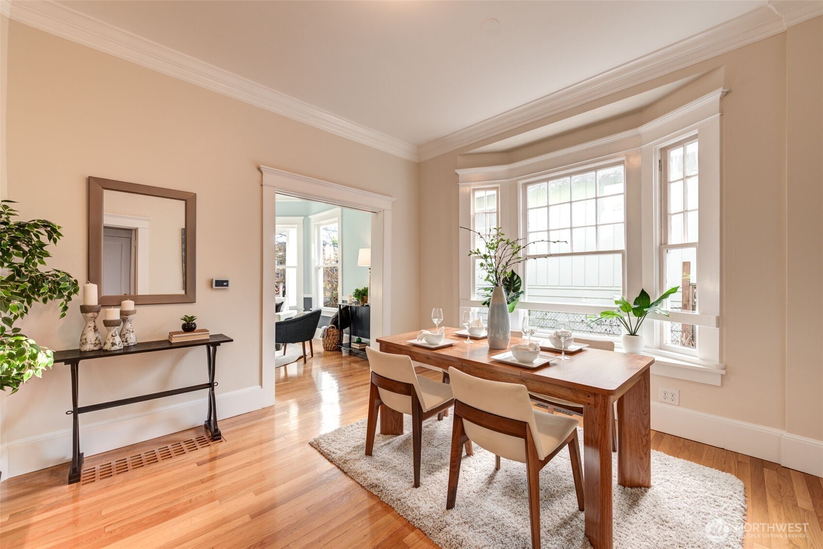 1523 35th Avenue Seattle, WA 98122 - Photo 10 of 35 a view of a dining room with furniture window and wooden floor