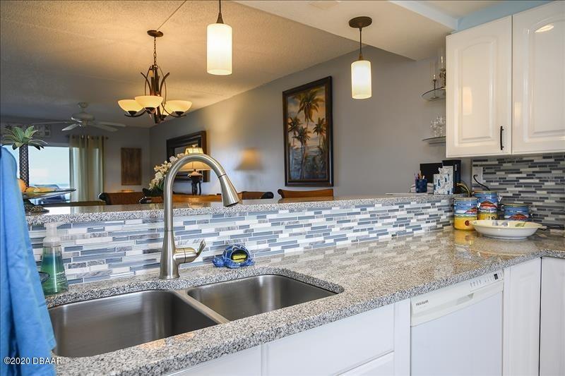 30 Inlet Harbor Road, Unit 603 Ponce Inlet, FL 32127 - Photo 11 of 35 Kitchen passthrough