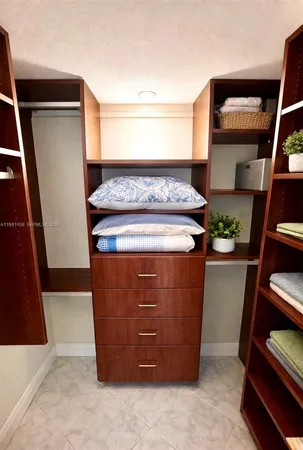 a stove top oven sitting inside of a kitchen