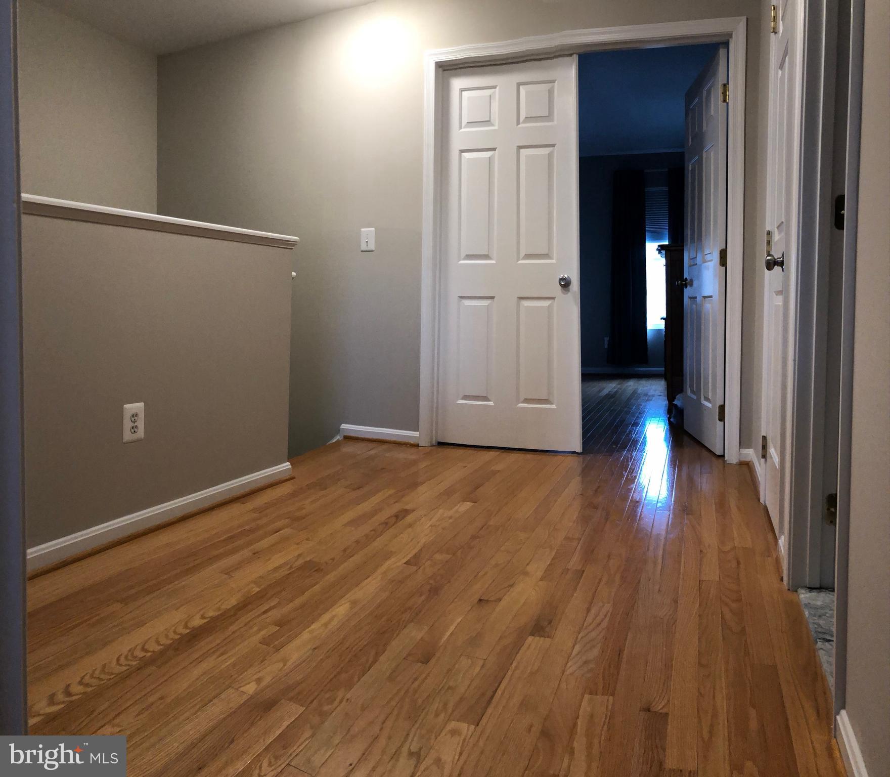 1715 Blue Flint Court Reston, VA 20190 - Photo 27 of 33 Upstairs Hallway landing