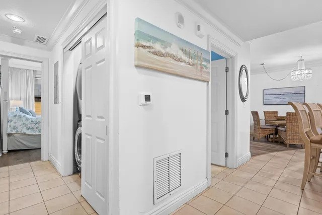 a view of a walk in closet and bedroom