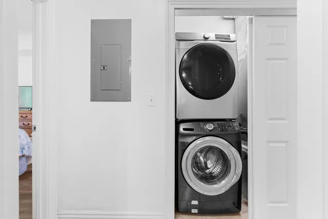 a view of a washer and dryer in a utility room