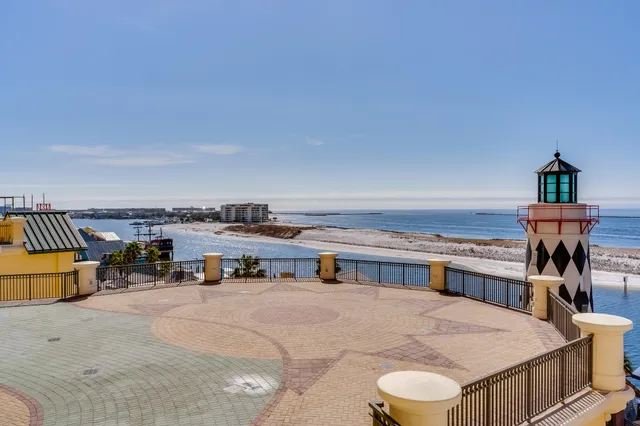 a view of a swimming pool with seating area