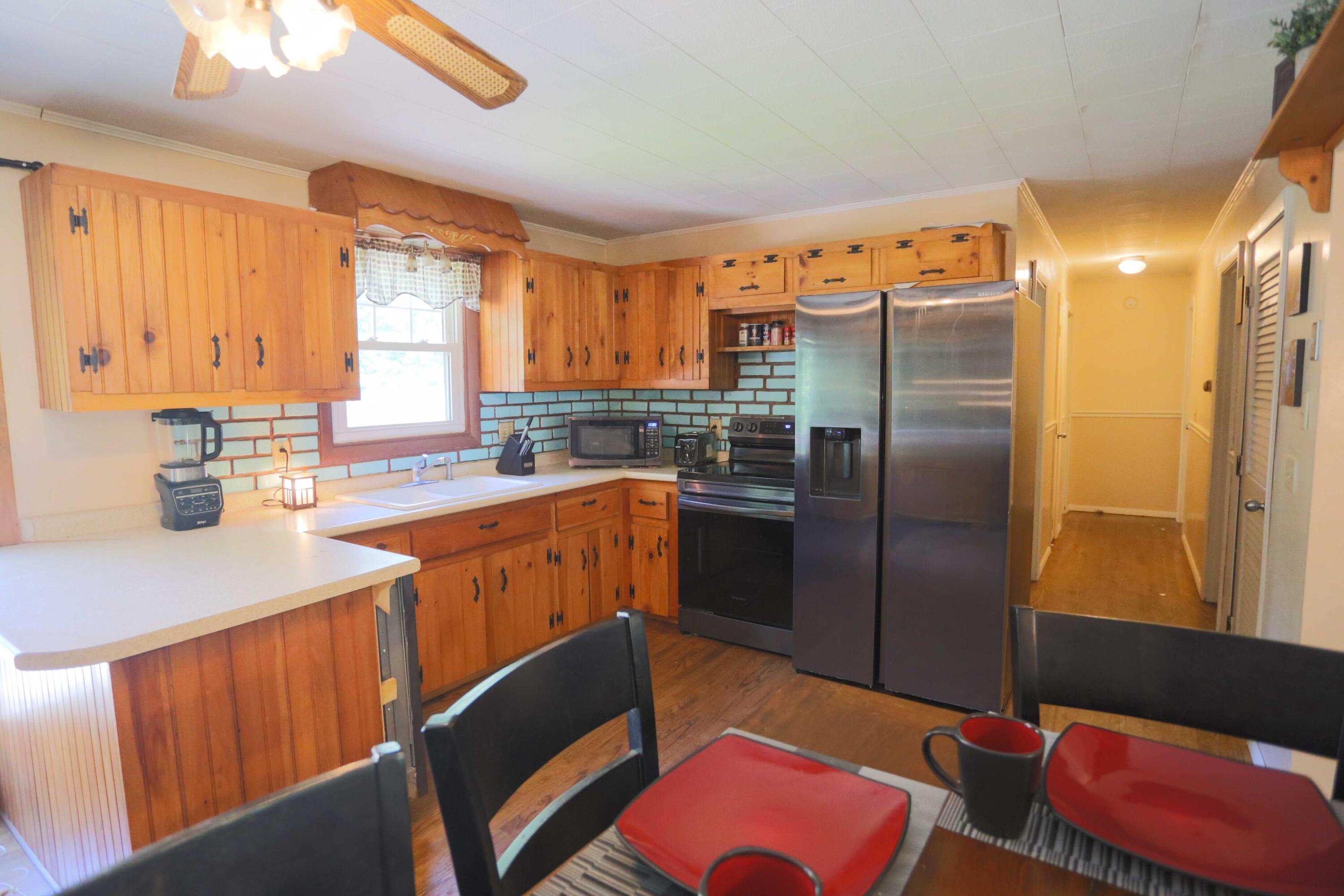 387 Crowley Road Sabattus, ME 04280 - Photo 5 of 19 Kitchen & Hallway