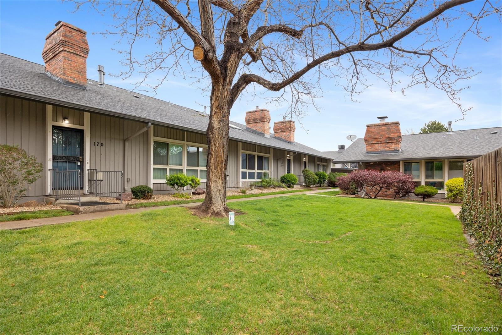 6495 East Happy Canyon Road, Unit 171 Denver, CO 80237 - Photo 27 of 27 a front view of house with yard