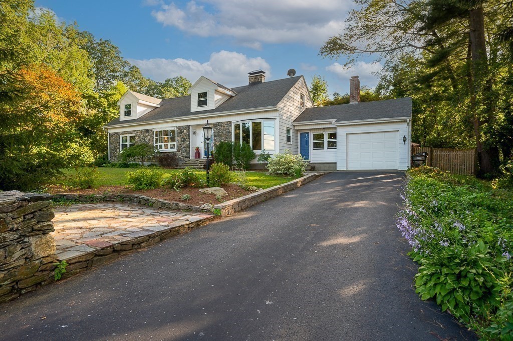 298 Thompson Road Webster, MA 01570 - Photo 1 of 42 a view of house in front of a big yard with large trees