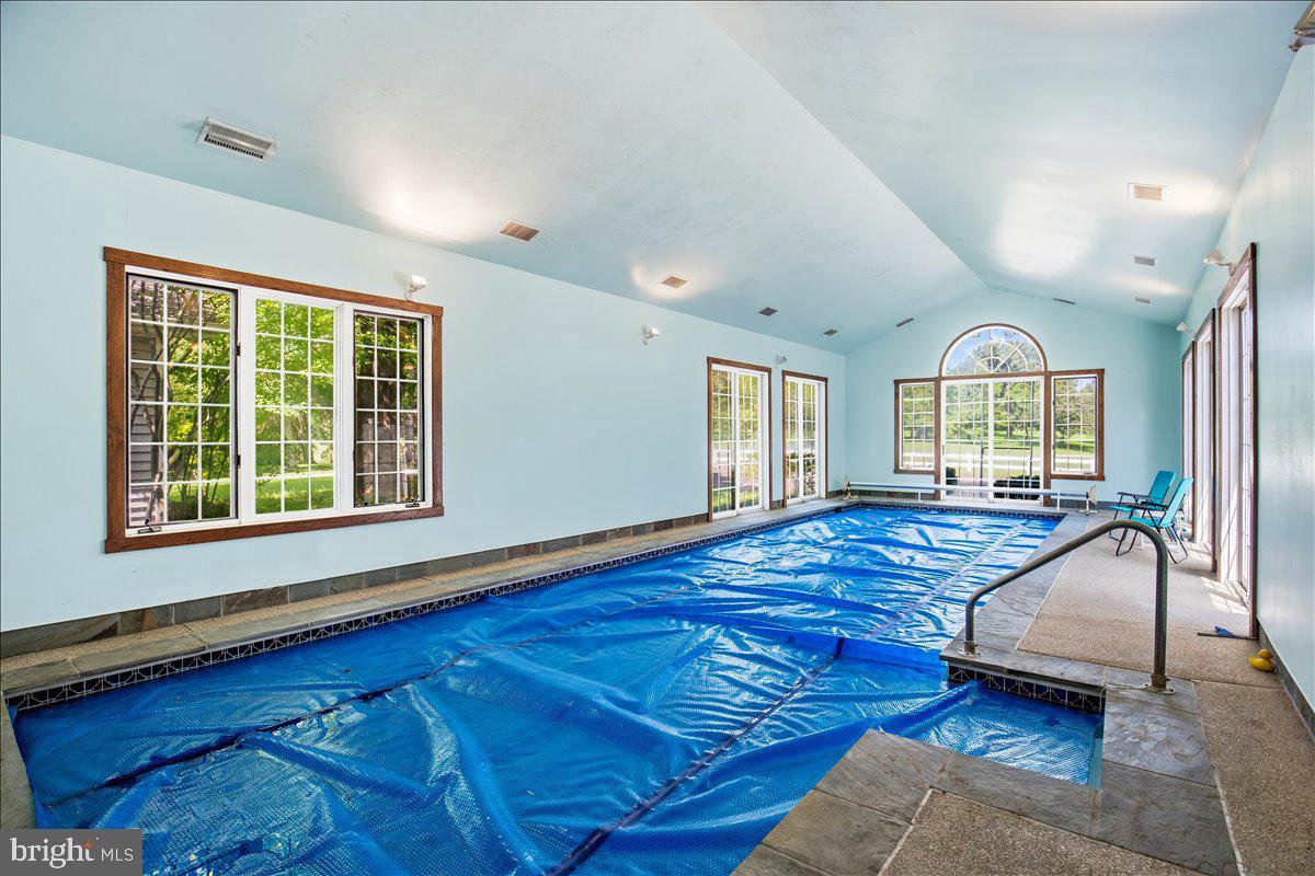 6110 Sheridan Point Road Prince Frederick, MD 20678 - Photo 25 of 77 Indoor pool oasis awaiting summer fun.