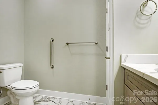 a bathroom with a sink and a toilet