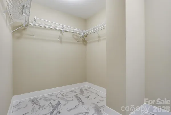 a view of a closet in a bedroom