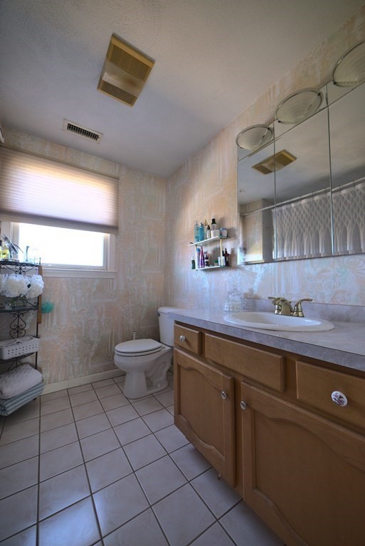 8 Sparrow Road Stoughton, MA 02072 - Photo 25 of 28 a kitchen with a sink and cabinets