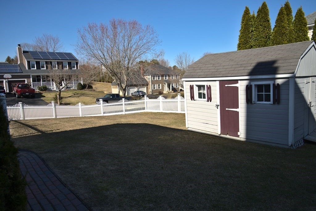 8 Sparrow Road Stoughton, MA 02072 - Photo 4 of 28 a view of a building with many windows