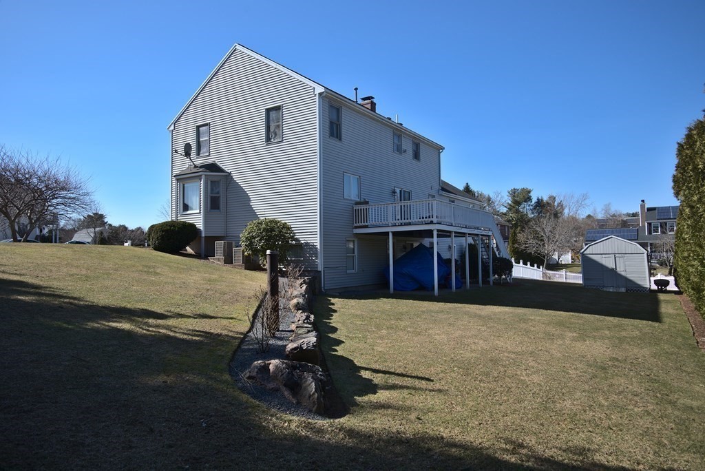 8 Sparrow Road Stoughton, MA 02072 - Photo 5 of 28 a view of a house with a yard