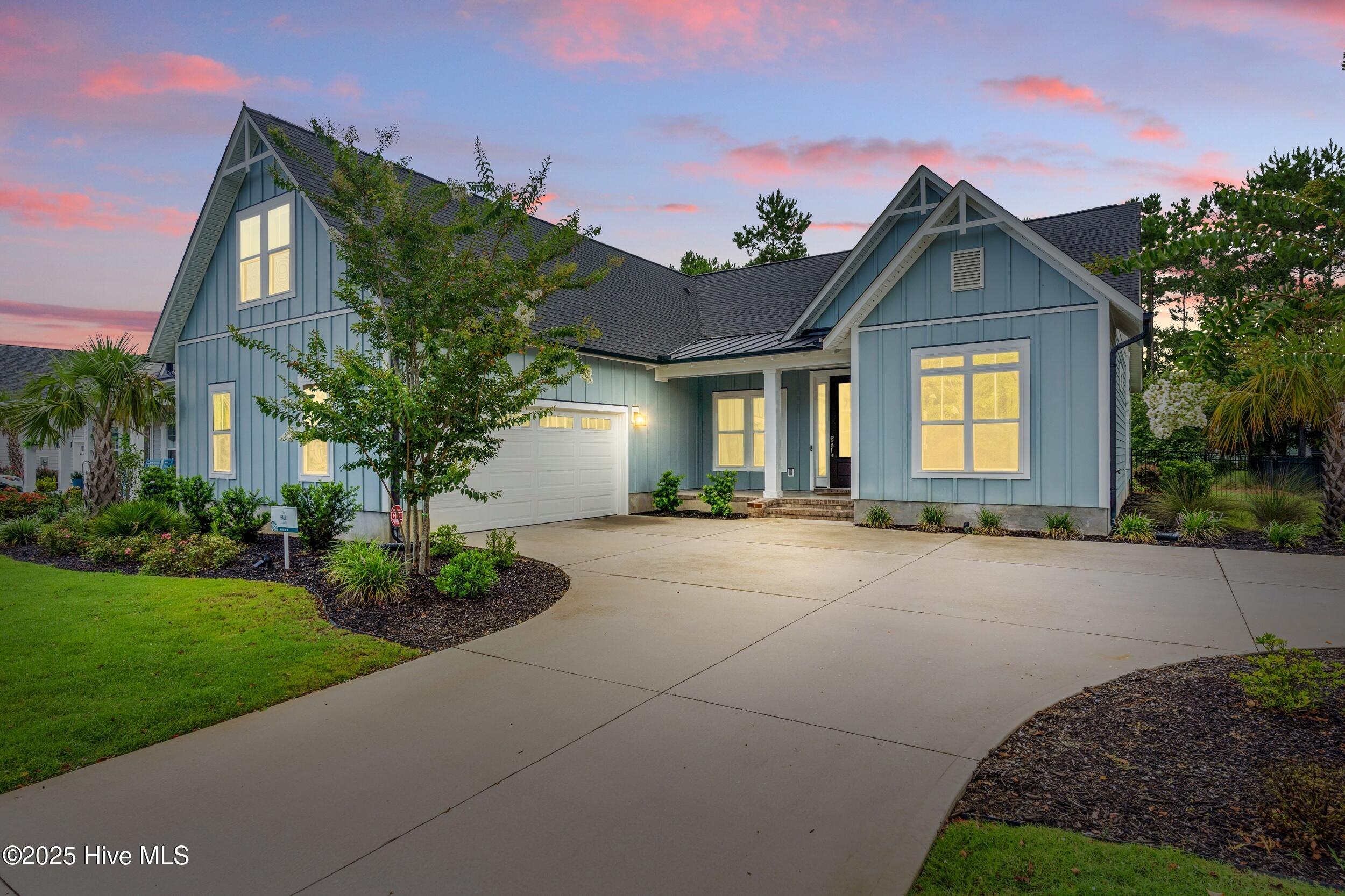 2676 West Timber Crest Drive Leland, NC 28451 - Photo 1 of 38 1_2676wtimbercrest_twilight