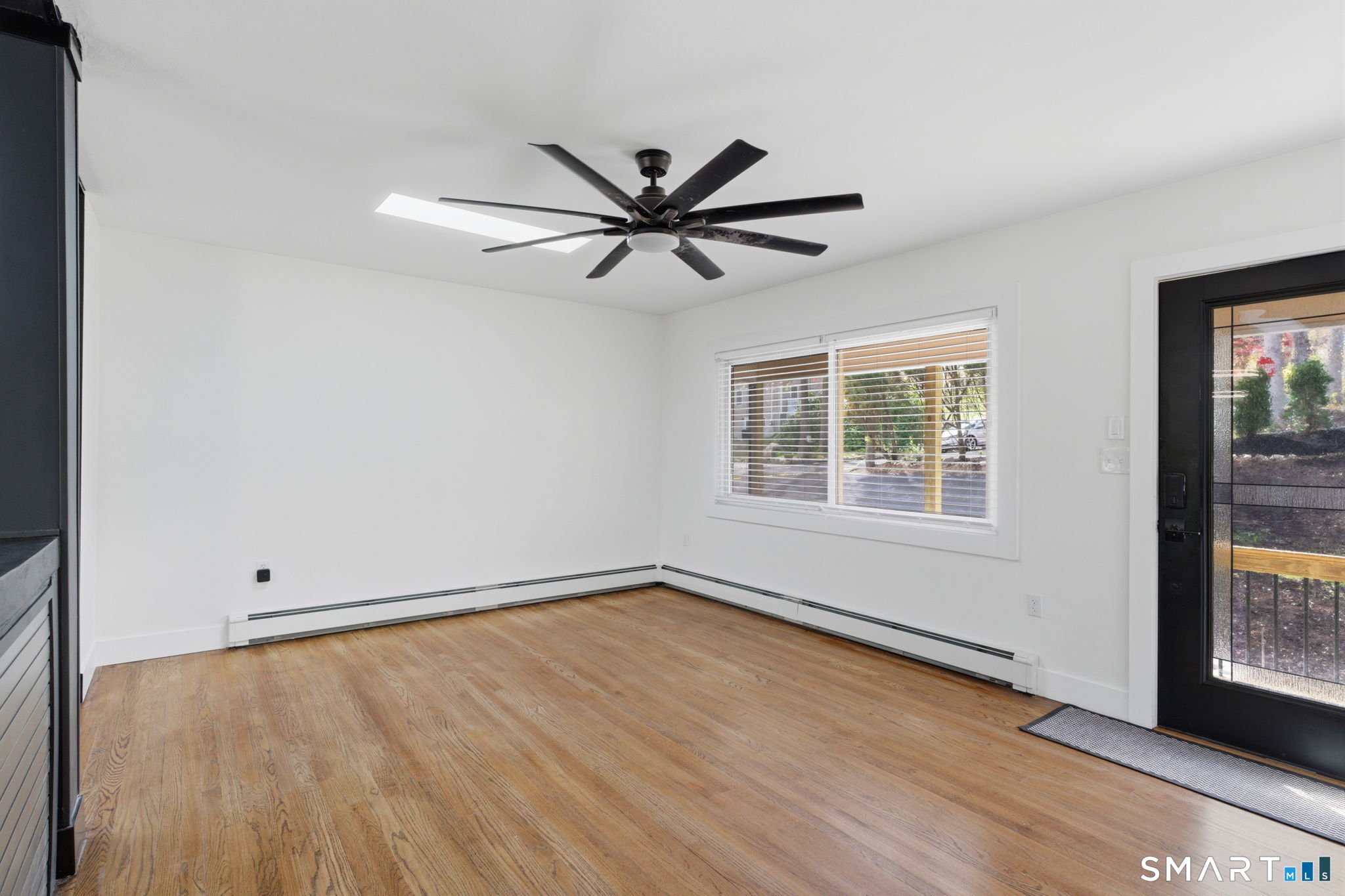 16 Beverly Road East Lyme, CT 06357 - Photo 11 of 40 wooden floor in an empty room with a window