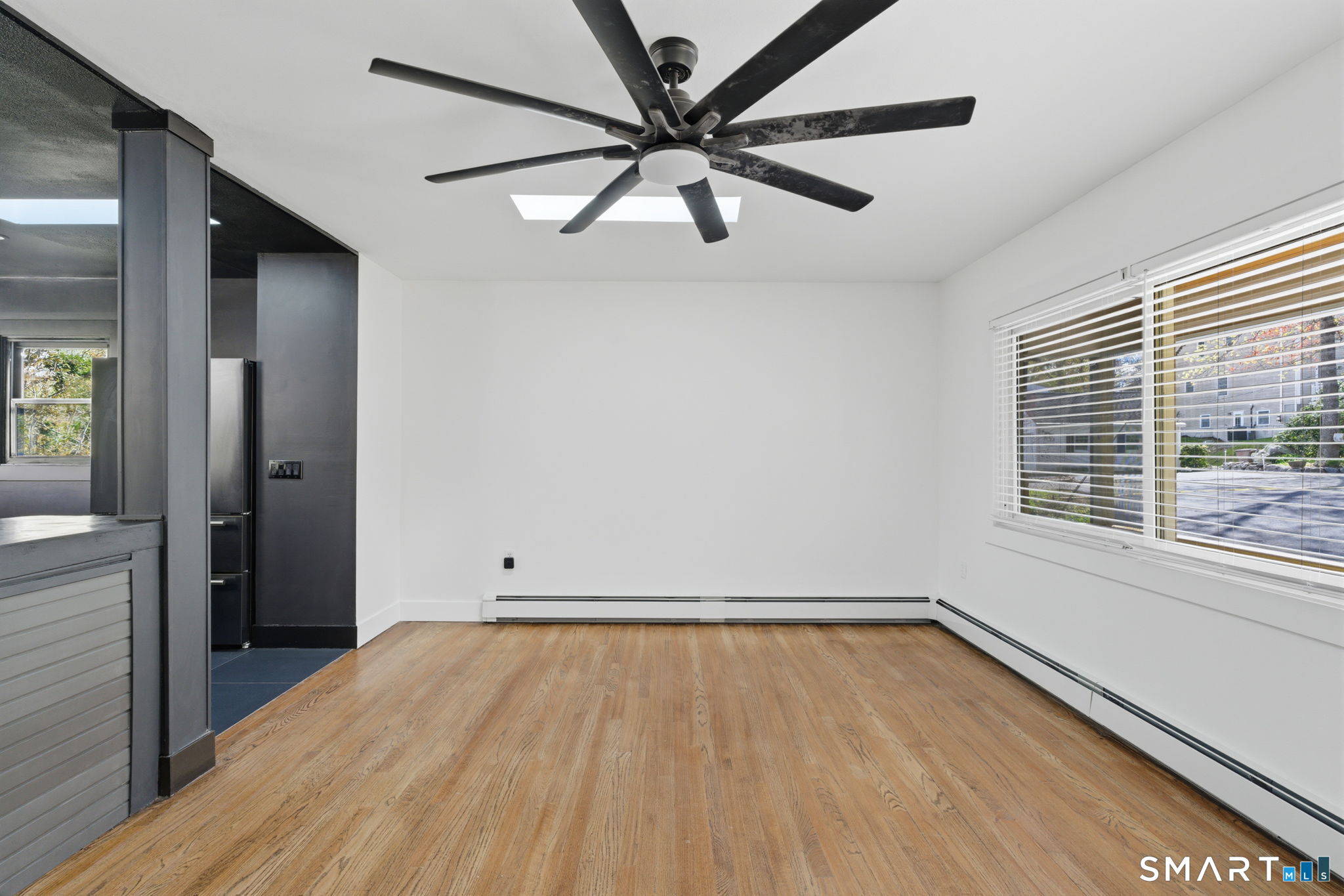 16 Beverly Road East Lyme, CT 06357 - Photo 12 of 40 wooden floor in an empty room with a window