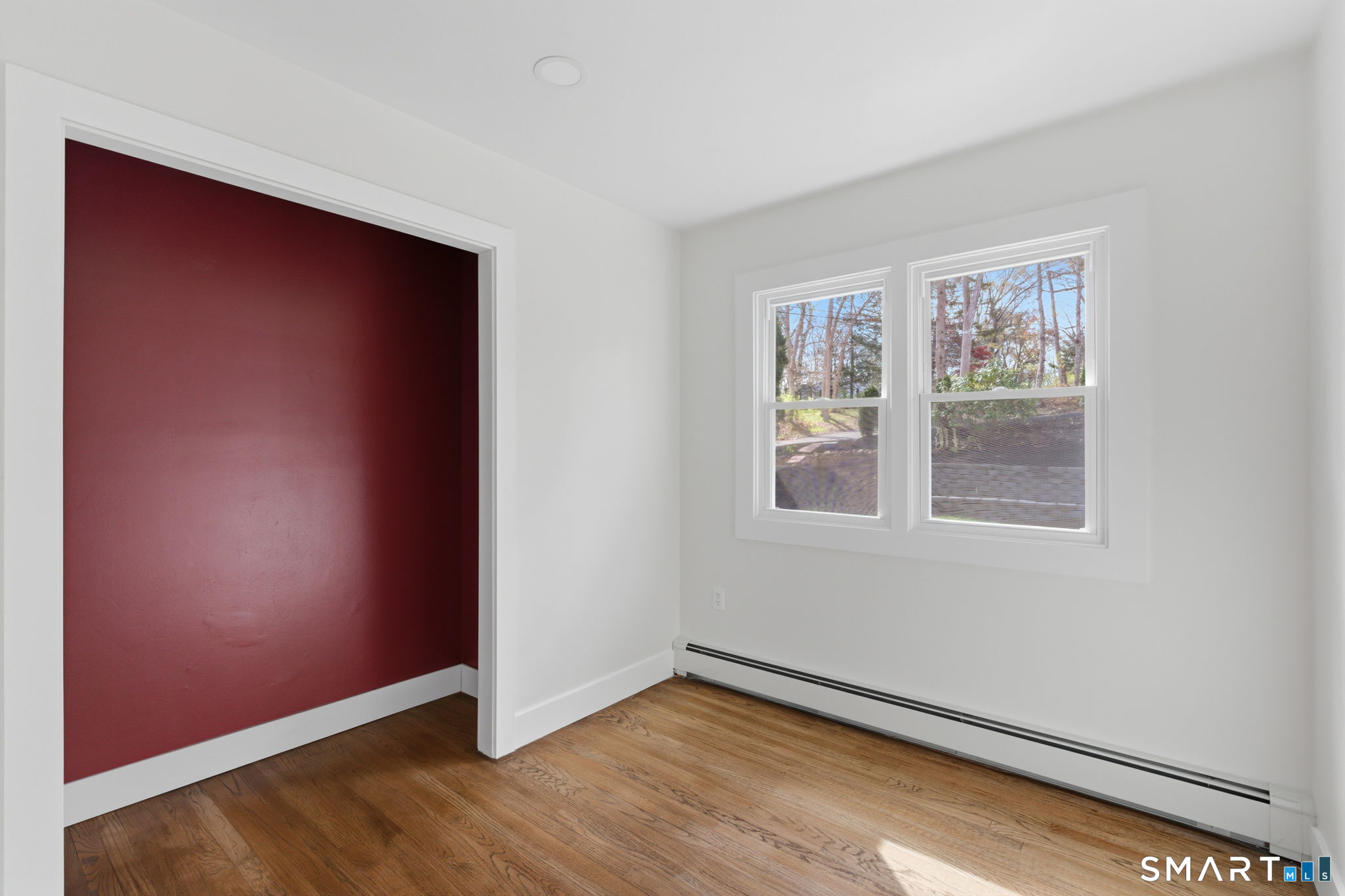 16 Beverly Road East Lyme, CT 06357 - Photo 24 of 40 an empty room with windows