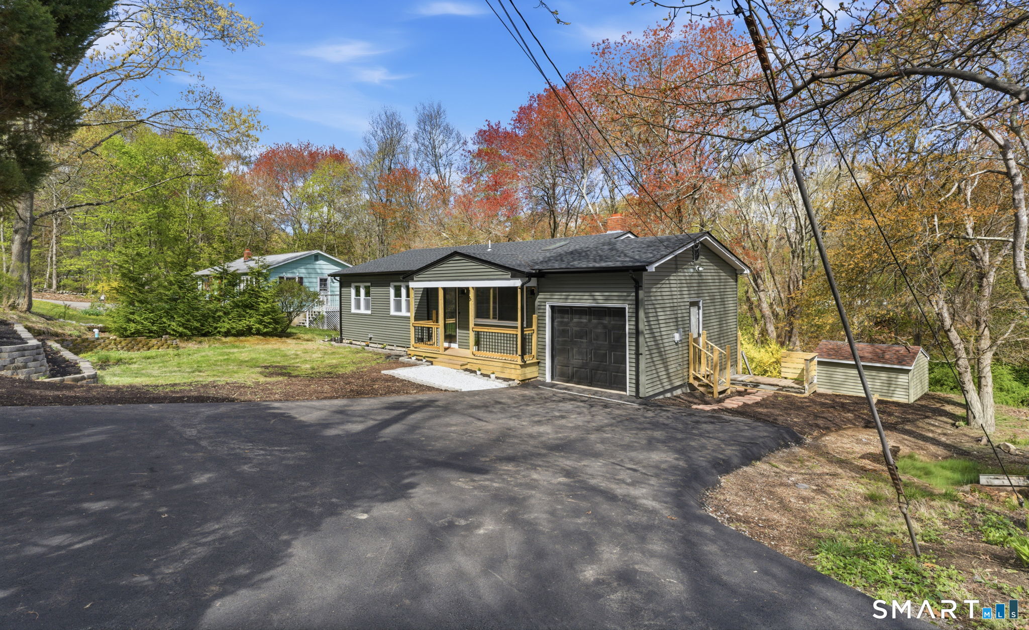 16 Beverly Road East Lyme, CT 06357 - Photo 3 of 40 a front view of a house with a garden