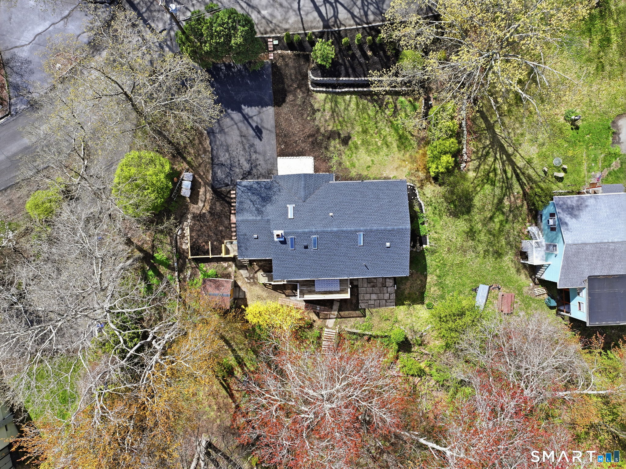 16 Beverly Road East Lyme, CT 06357 - Photo 7 of 40 an aerial view of a house with a yard swimming pool outdoor seating and yard