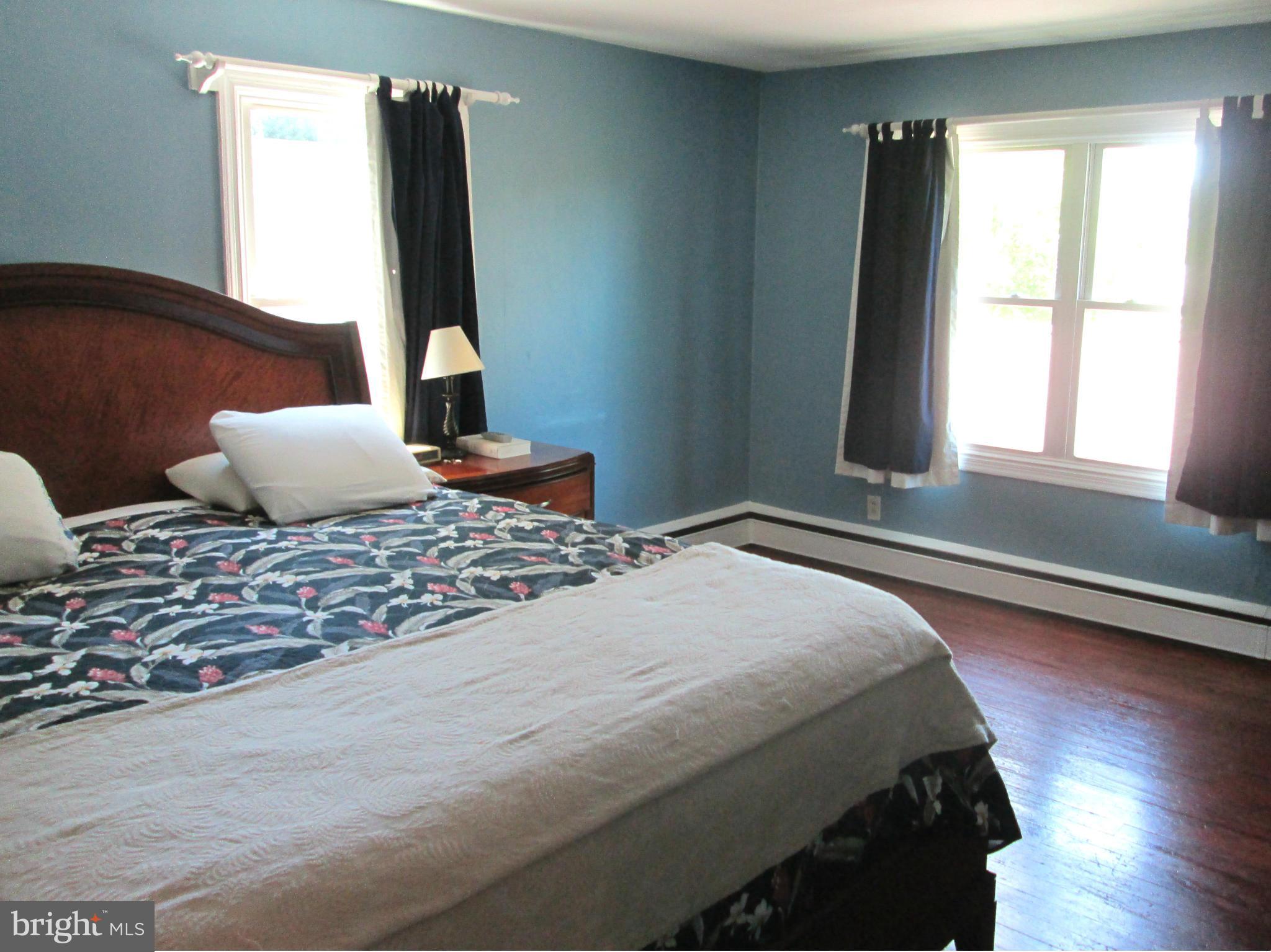 3061 Evans Road Riva, MD 21140 - Photo 13 of 22 a bedroom with a bed and window