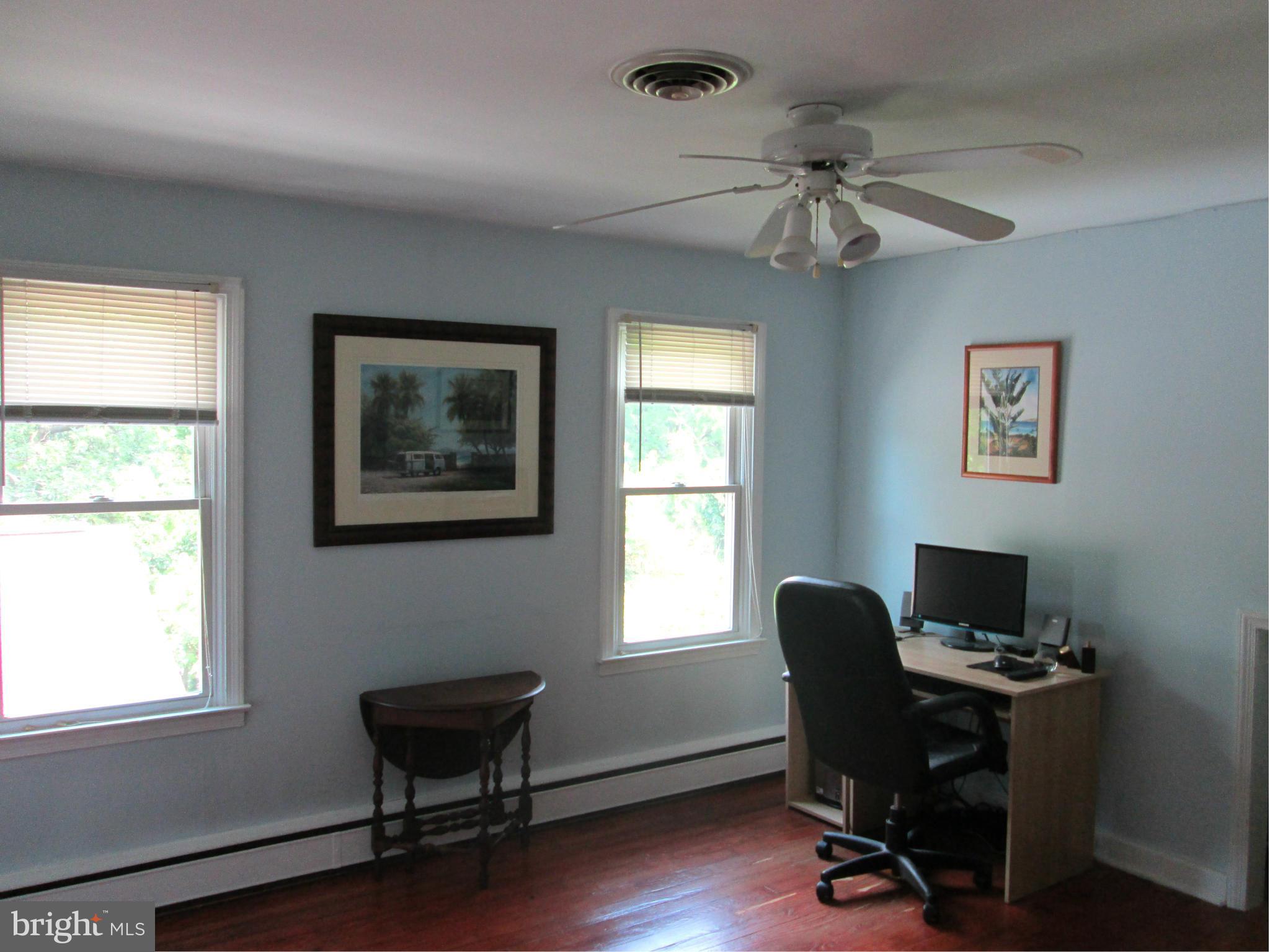 3061 Evans Road Riva, MD 21140 - Photo 15 of 22 a workspace with wooden floor and a window