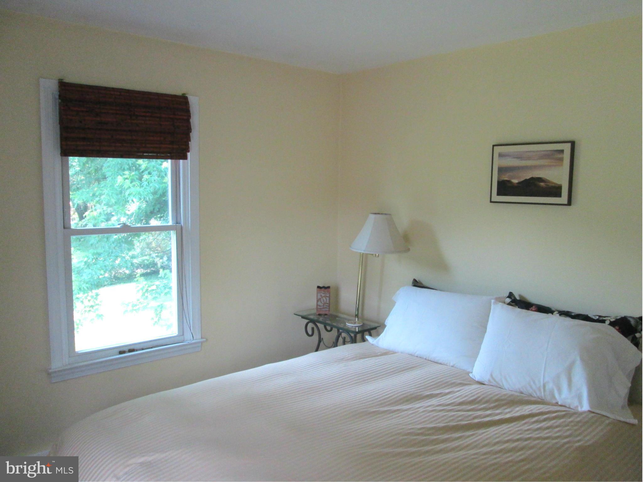 3061 Evans Road Riva, MD 21140 - Photo 16 of 22 a bedroom with a bed and a window