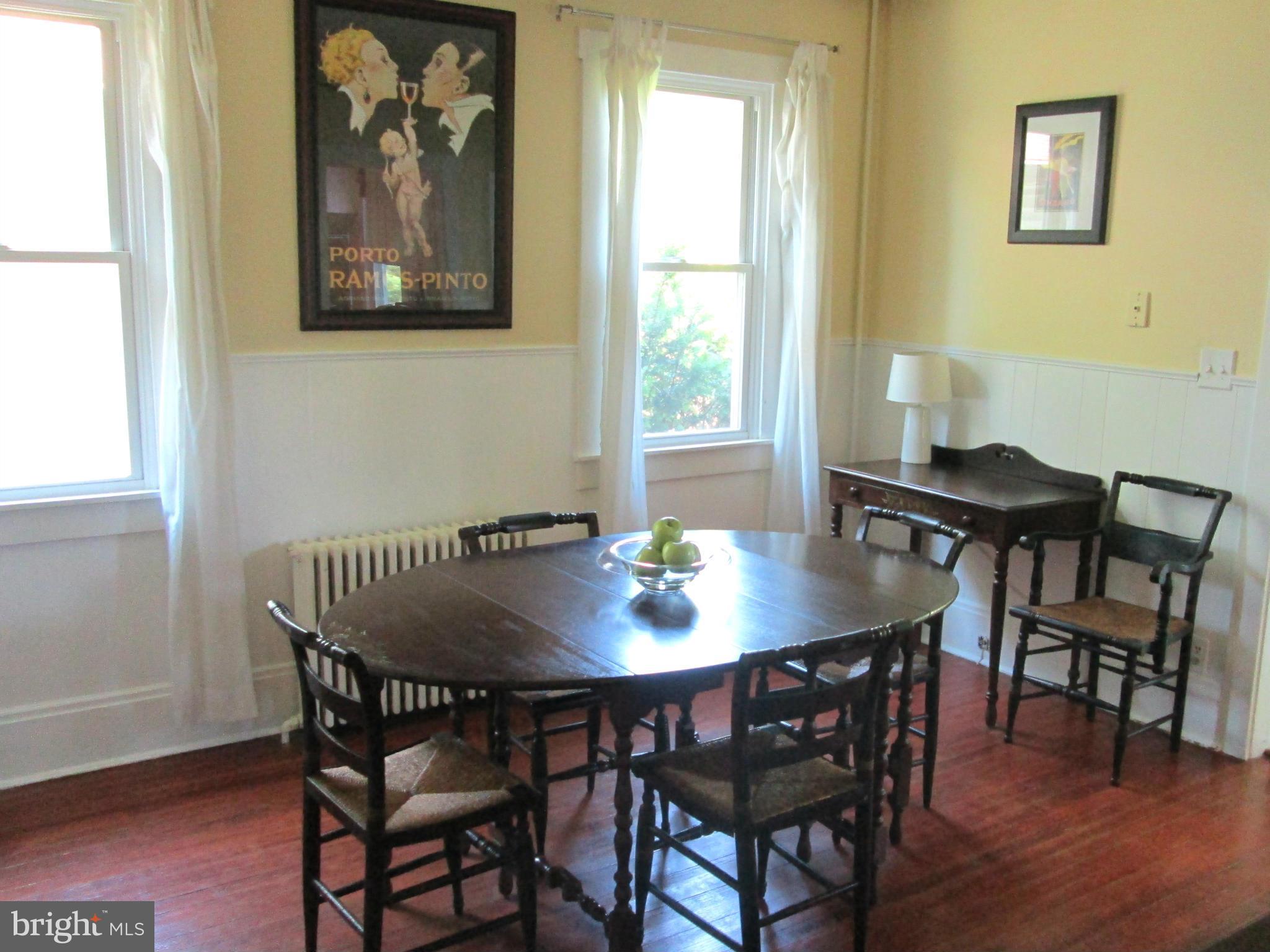 3061 Evans Road Riva, MD 21140 - Photo 17 of 22 a view of a dining room with furniture and wooden floor
