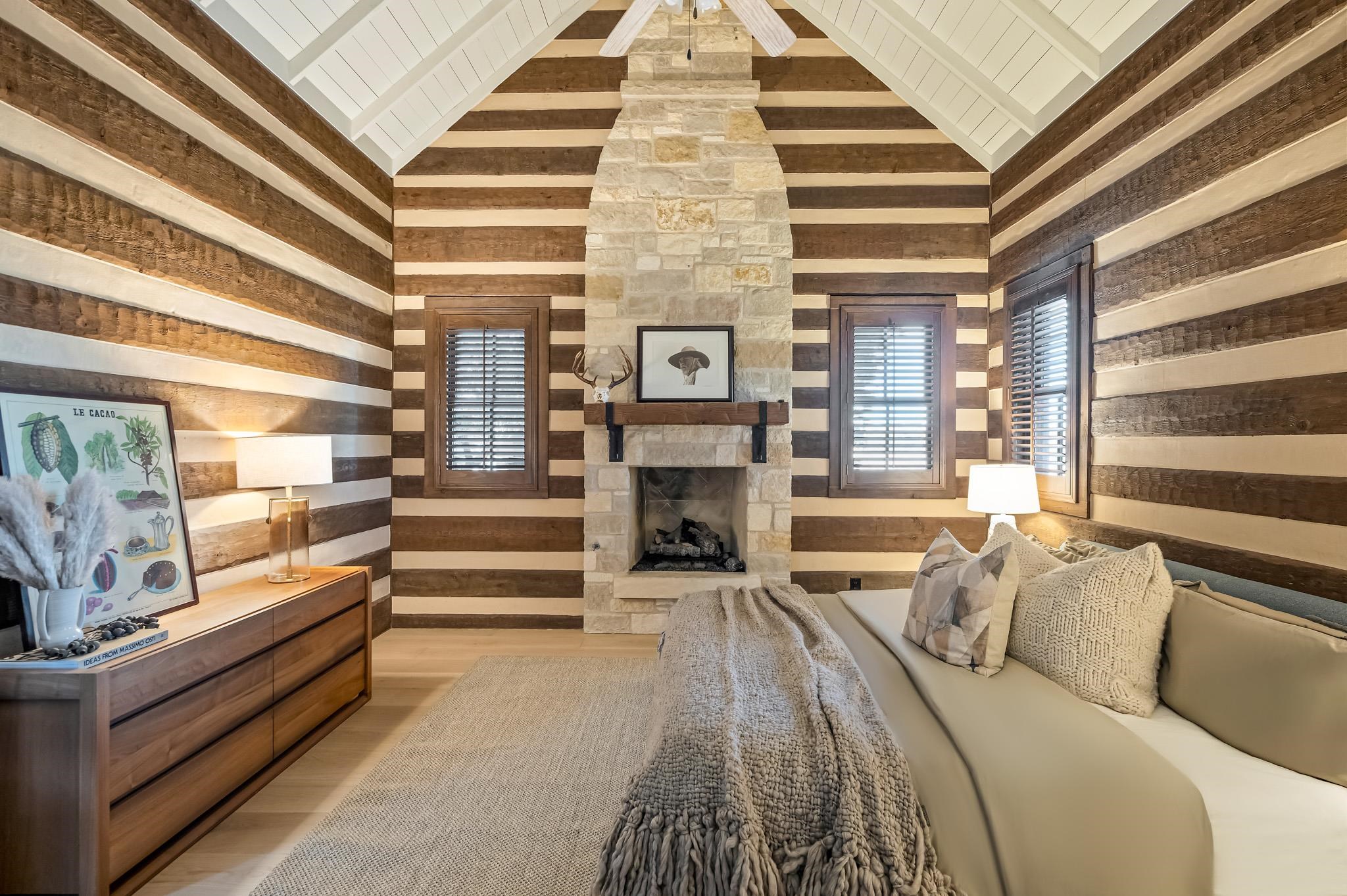 65 Riviera Cove Fredericksburg, TX 78624 - Photo 11 of 26 a living room with furniture and a fireplace