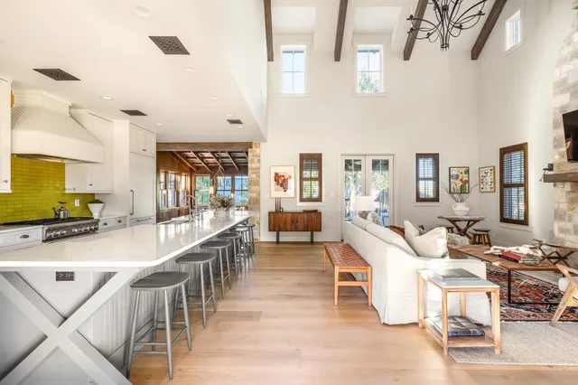 a large room with lots of table and chairs