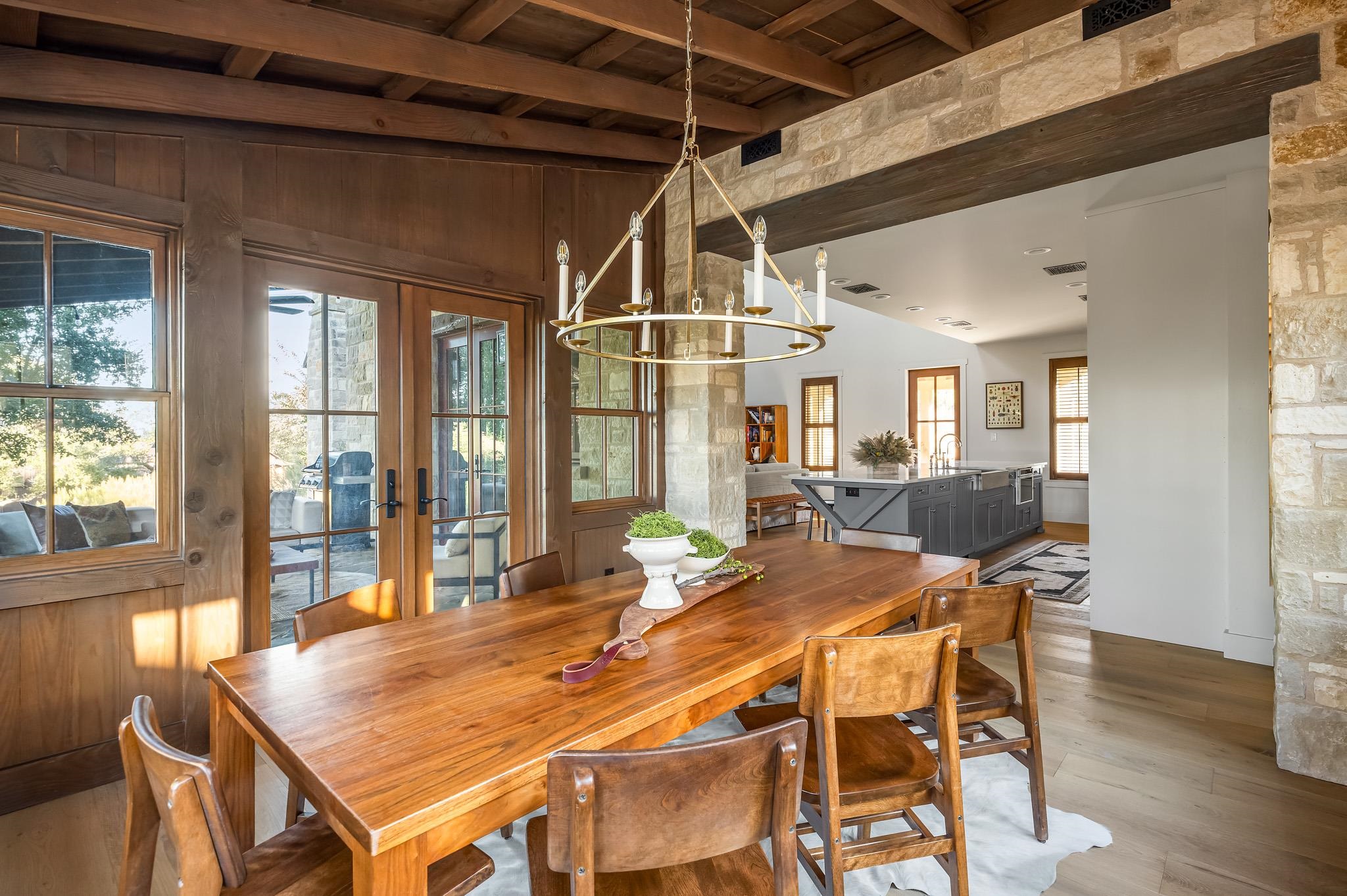 65 Riviera Cove Fredericksburg, TX 78624 - Photo 7 of 26 a view of a dining room with furniture window and wooden floor