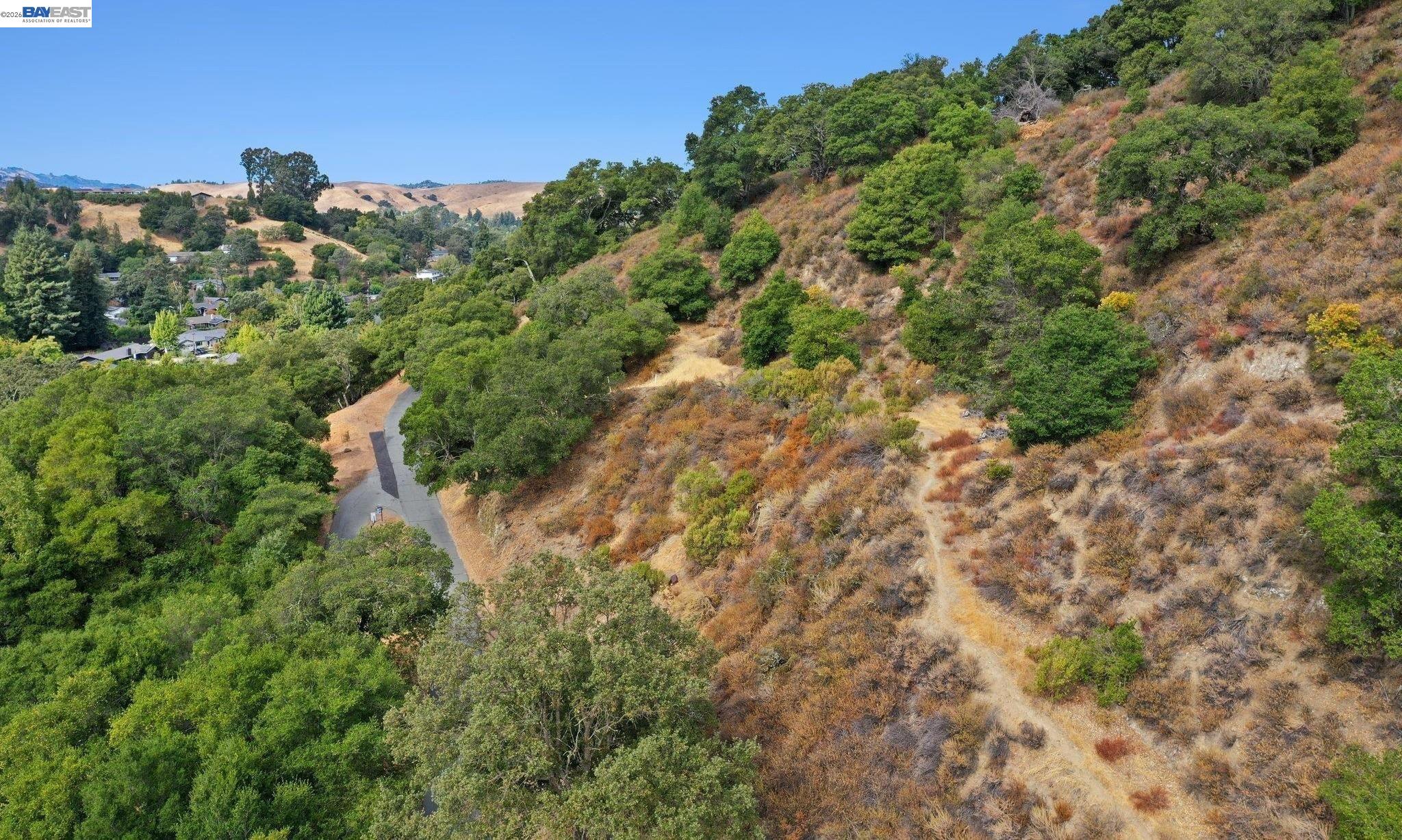 0 Hunsaker Canyon Road Lafayette, CA 94549 - Photo 21 of 26 a view of a forest with a houses