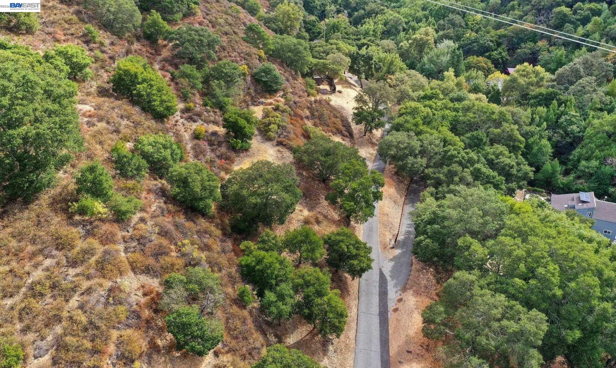 0 Hunsaker Canyon Road Lafayette, CA 94549 - Photo 22 of 26 an aerial view of residential house with outdoor space and trees all around