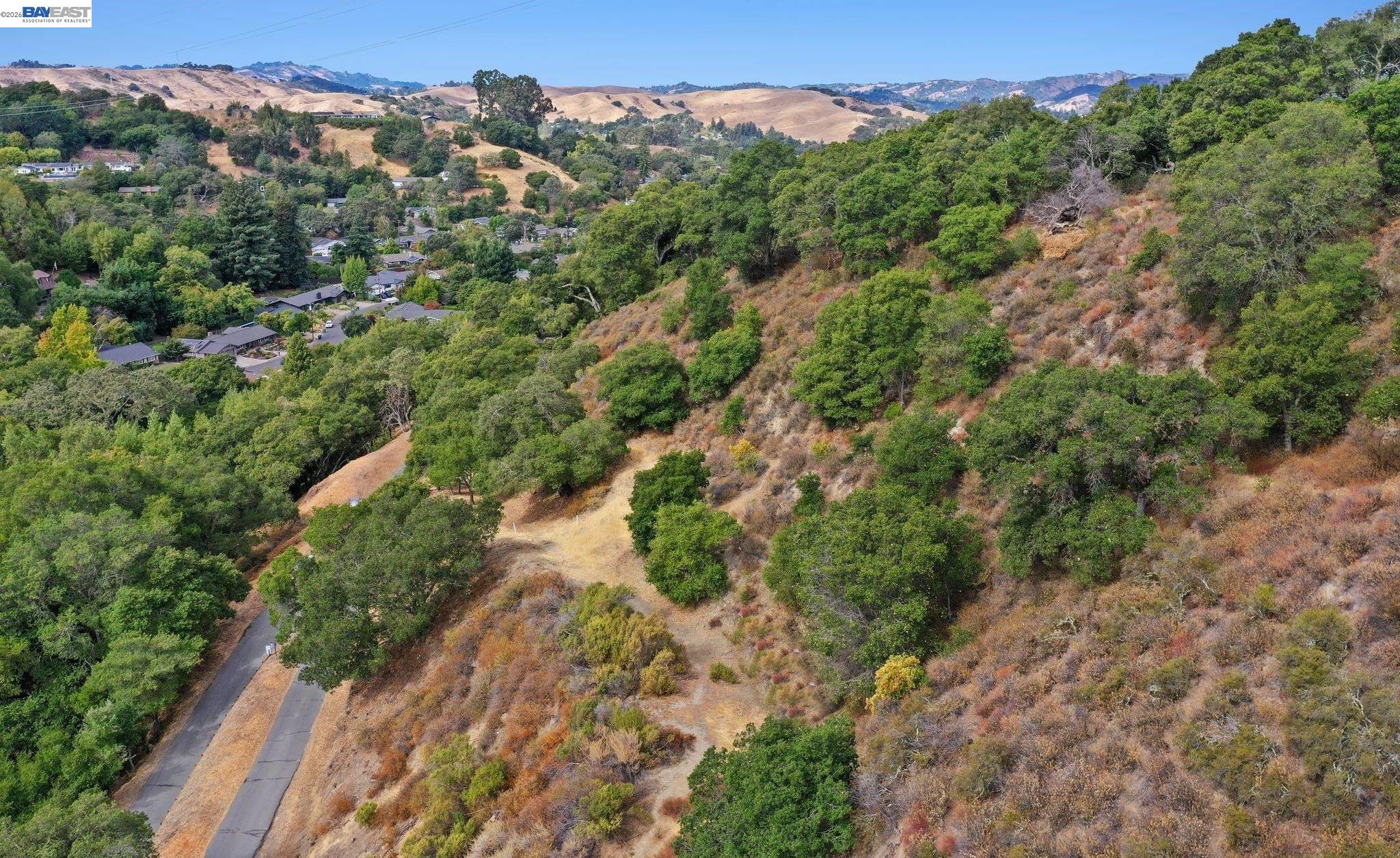 0 Hunsaker Canyon Road Lafayette, CA 94549 - Photo 24 of 26 an aerial view of a forest with houses