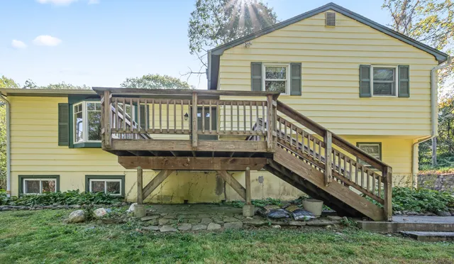 a view of a house with a roof deck