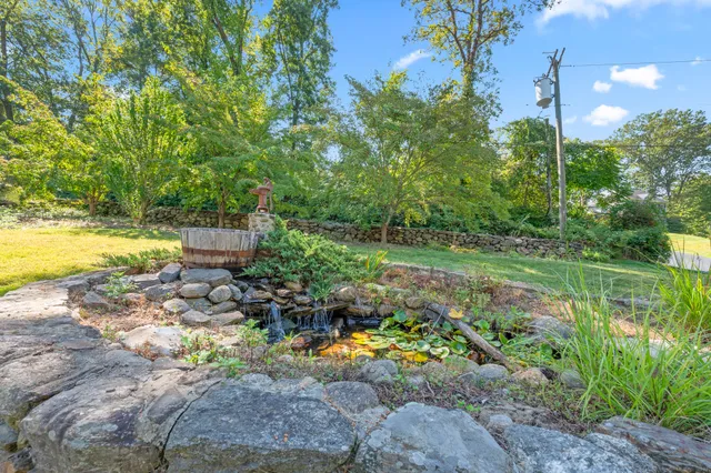 a garden view with a lake view