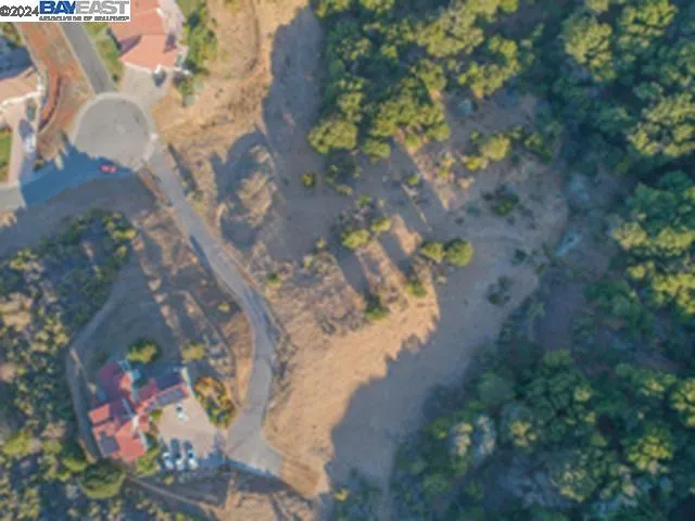 an aerial view of a house having yard