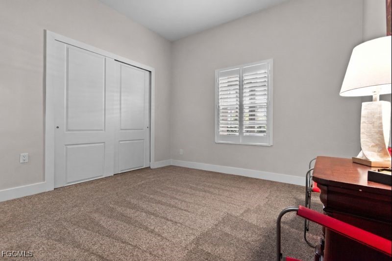 2110 West First Street, Unit 101 Fort Myers, FL 33901 - Photo 16 of 34 a view of an empty room with a window