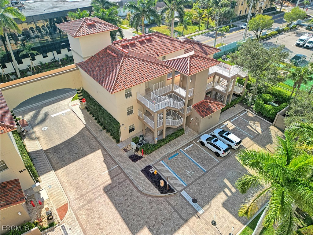 2110 West First Street, Unit 101 Fort Myers, FL 33901 - Photo 23 of 38 an aerial view of a house with a yard