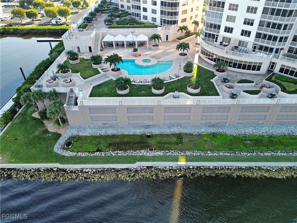 2110 West First Street, Unit 101 Fort Myers, FL 33901 - Photo 29 of 38 a view of building and lake